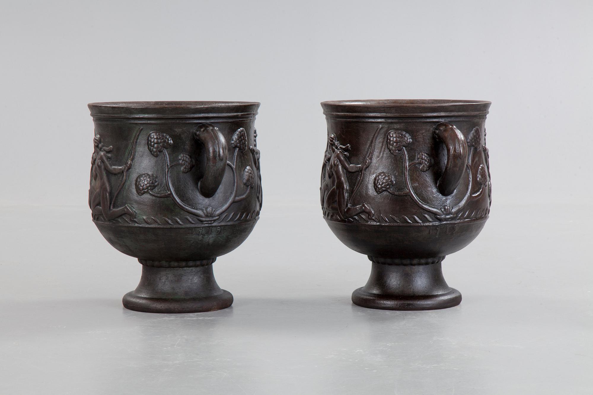 Ivar Johnsson, a pair of Swedish Grace cast iron jardinières, 'Diana' by Näfveqvarn, Sweden 1920's.