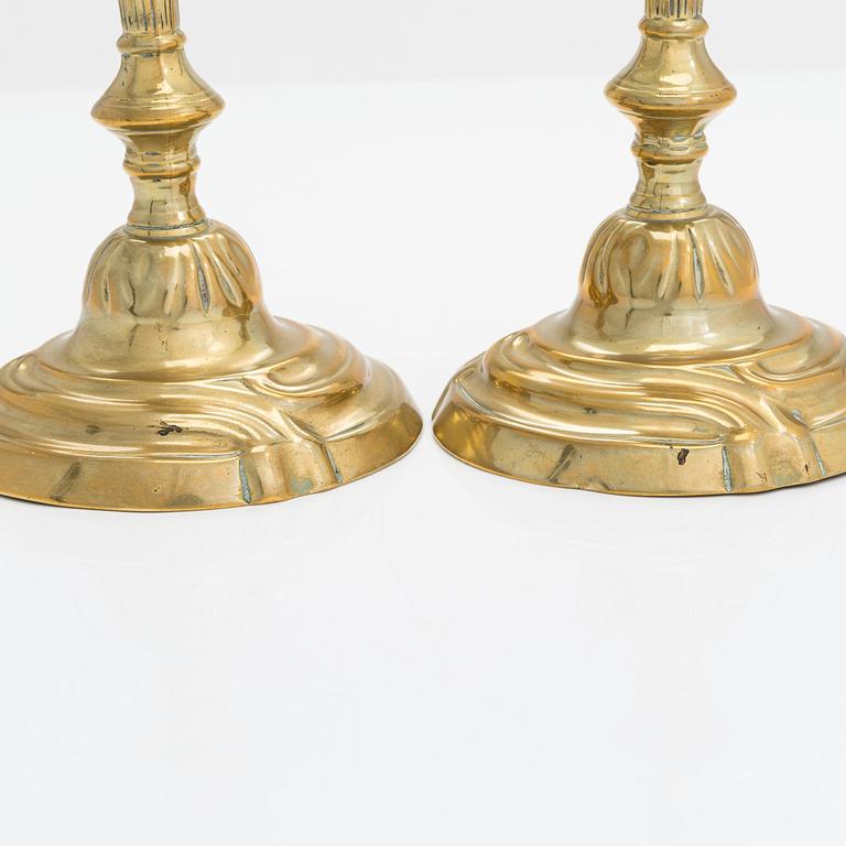 A pair of mid-18th century candlesticks France.