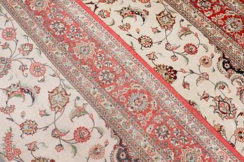 A silk Ghom carpet, 295 x 195 cm.