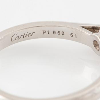 A Cartier ring in platinum with a round brilliant-cut diamond 0.91 ct according to the engraving.