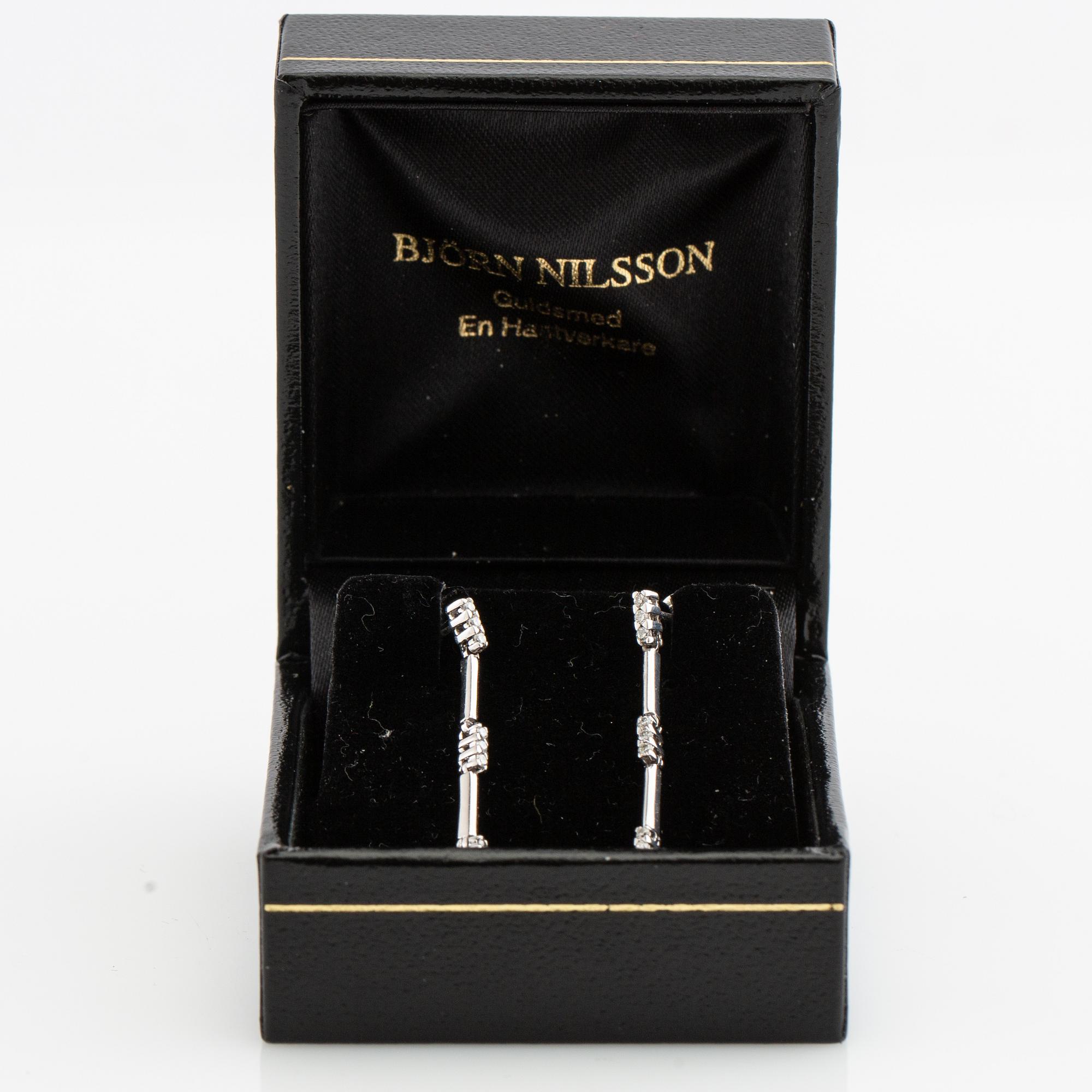 Earrings, a pair, 18k white gold with brilliant-cut diamonds.