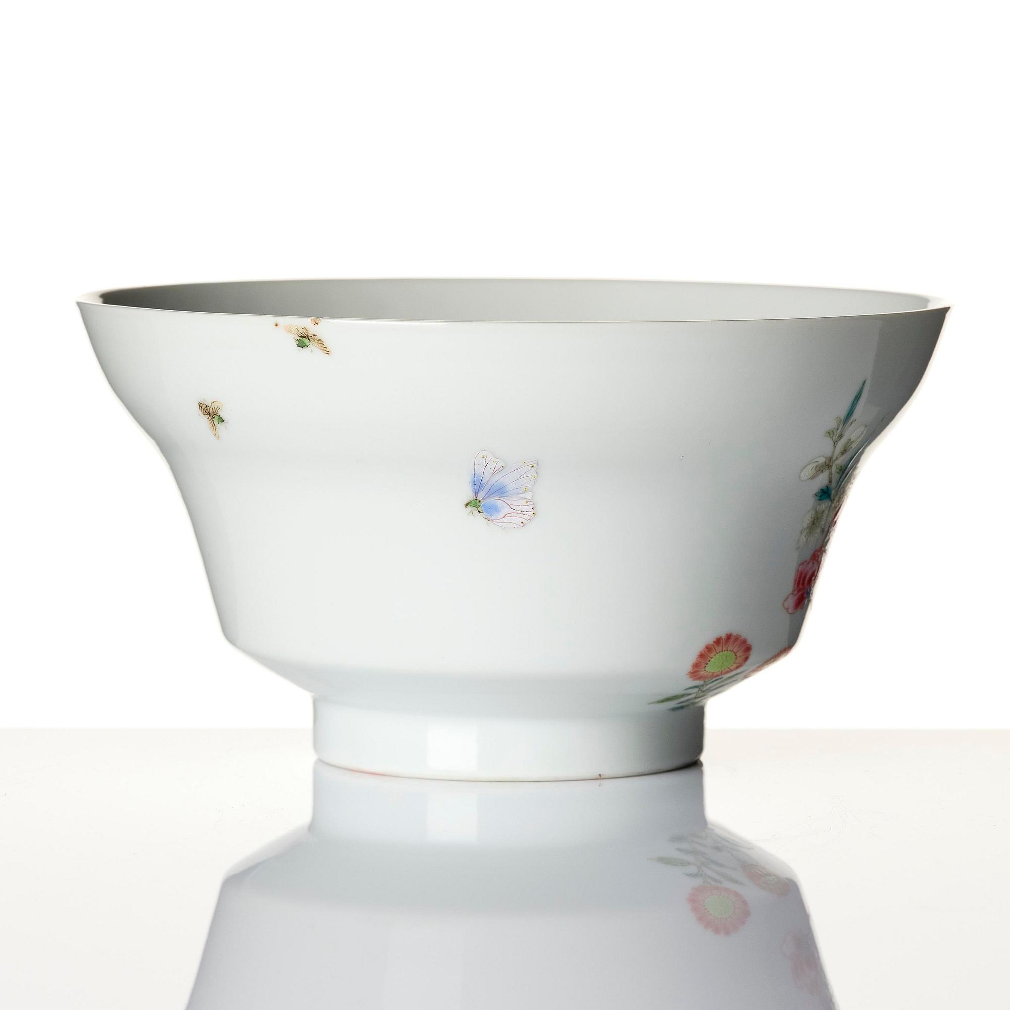 A fine famille rose ''prunus and magnolia' bowl, Qing dynasty.