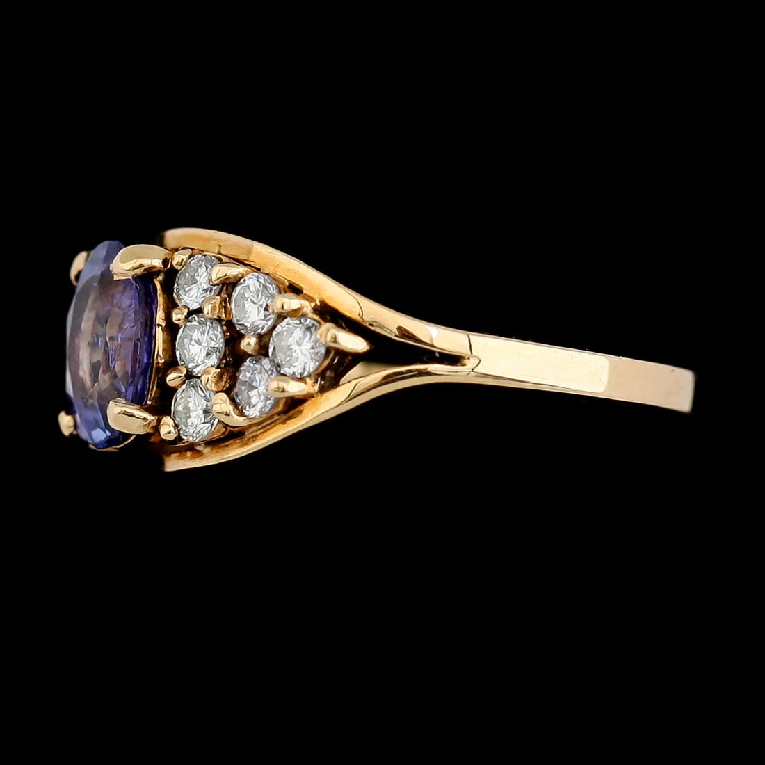 RING, 18K guld, tanzanit och briljantslipade diamanter. Vikt ca 4 g.