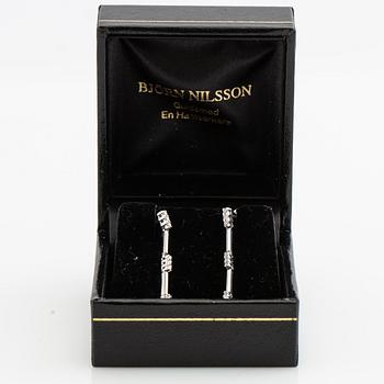 Earrings, a pair, 18k white gold with brilliant-cut diamonds.