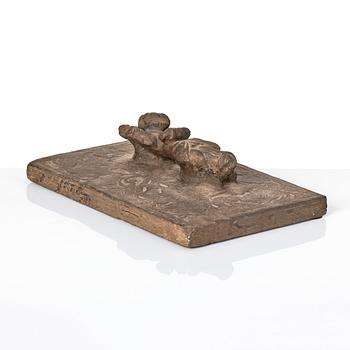 A heavy stone slate/press, presumably Ming dynasty (1368-1644).