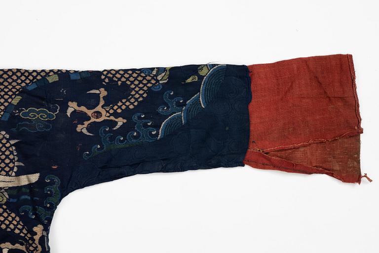 A rare fragment of a silk four clawed 'dragon' jacket, late Ming dynasty/early Qing dynasty.