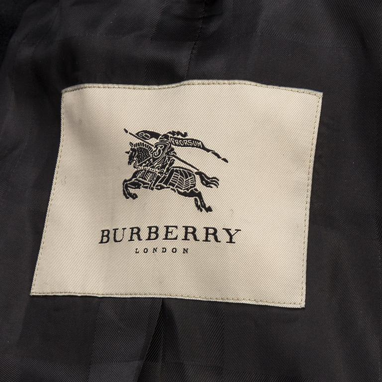 A coat by Burberry in size 40.