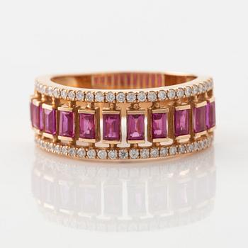 Step cut ruby and brilliant cut diamond ring.