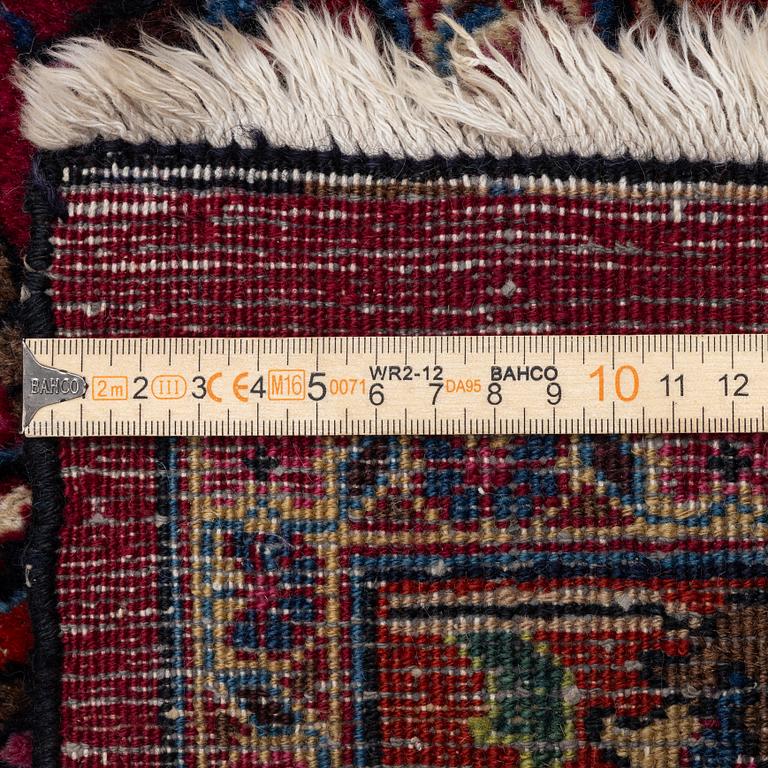 A Meshed carpet, c. 393 x 305 cm.