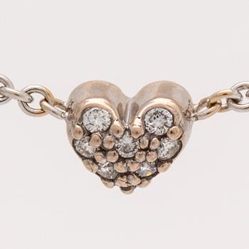 Lynggaard pendant on cjain, 18k whitegold brilliant-cut diamonds 0,08 ct, width heart approx 5 mm, length 40 cm, dustbag.