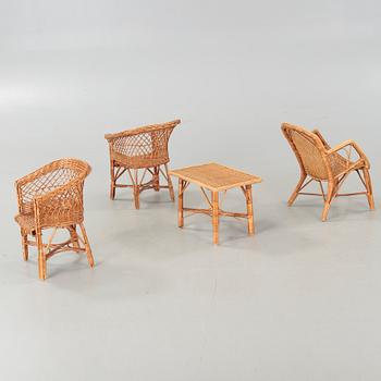 Four childrens rattan furniture from around year 1900 and from the 20th century.