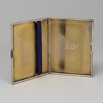 A sterling silver cigarette-case, made in 1935 by Dingley (or Davies) Brothers, Birmingham, England.