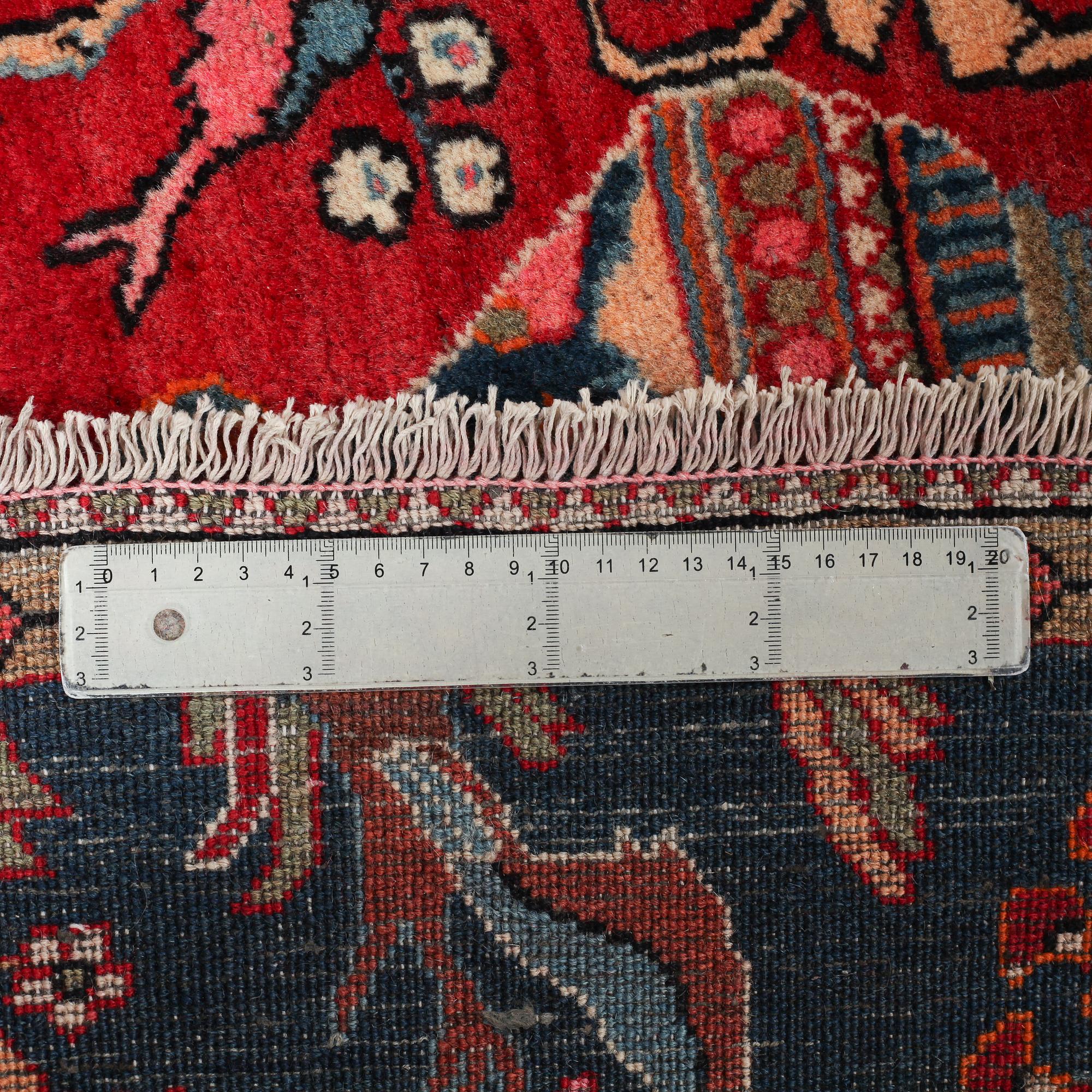 AN OLD/SEMI ANTIQUE ARAN RUG, 194 x 130 cm.