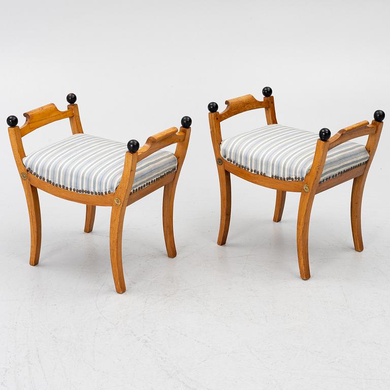 A pair of late Empire stools, mid-19th century.