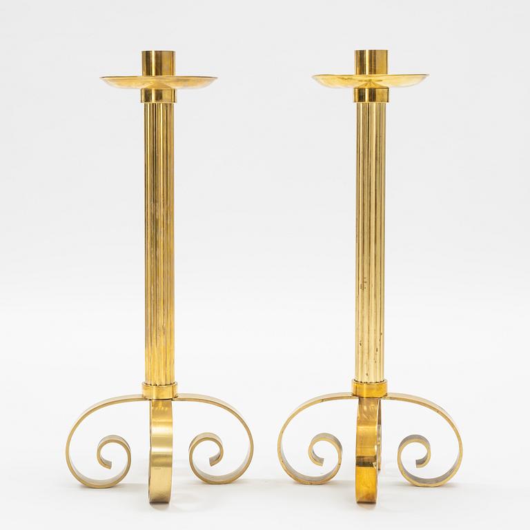 Ivar Ålenius-Björk, a pair of brass candle holders, Ystad Metall.