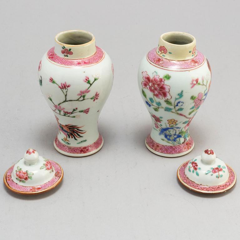 A set of three famille rose plates and two minature vases with covers, Qing dynasyt, Qianlong (1736-95).