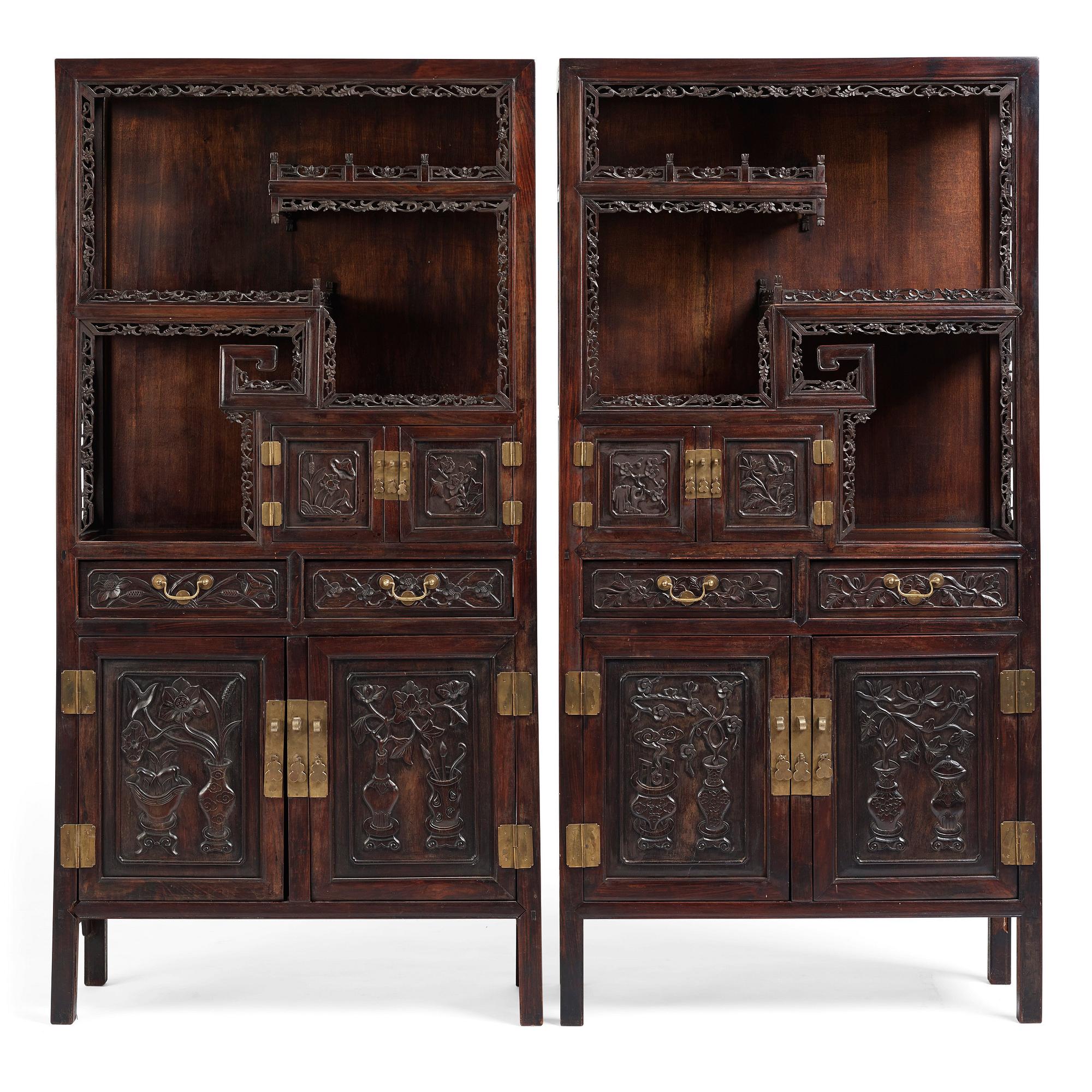A pair of Chinese hardwood display cabinets, Qing dynasty, 19th Century.