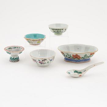 A set of three famille rose bowls, a footed dish, a spoon and a stemcup, late Qing dynasty, 19th century.