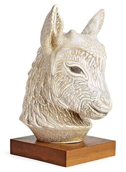 303. A Gunnar Nylund stoneware figure of a kid's head, Rörstrand.