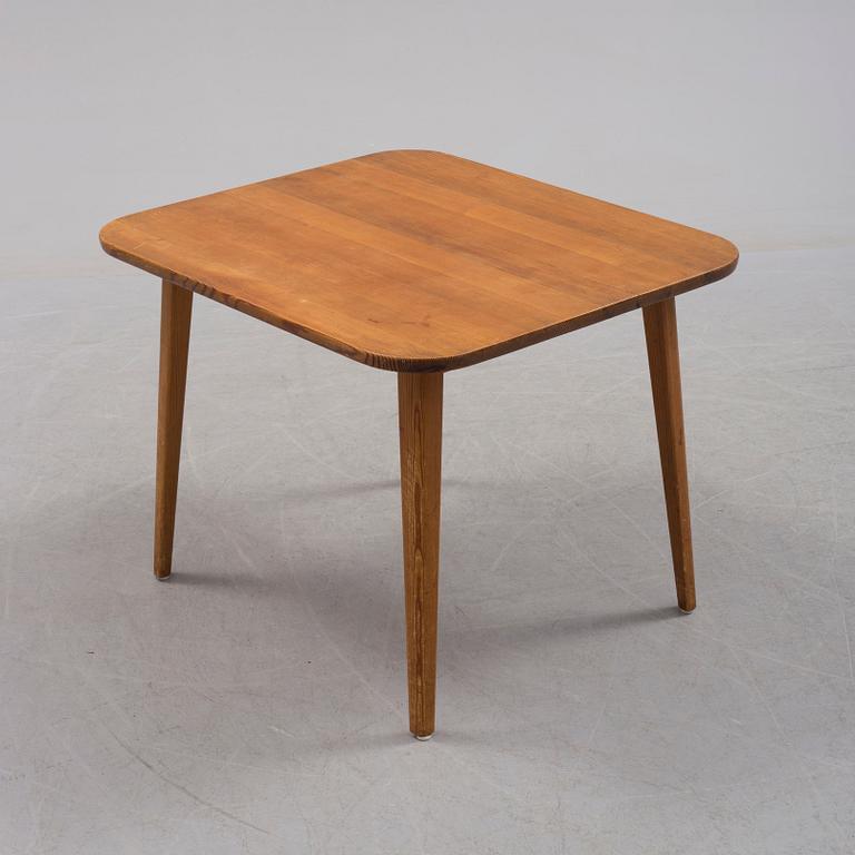 A pine table by Carl Malmsten, late 20th century.