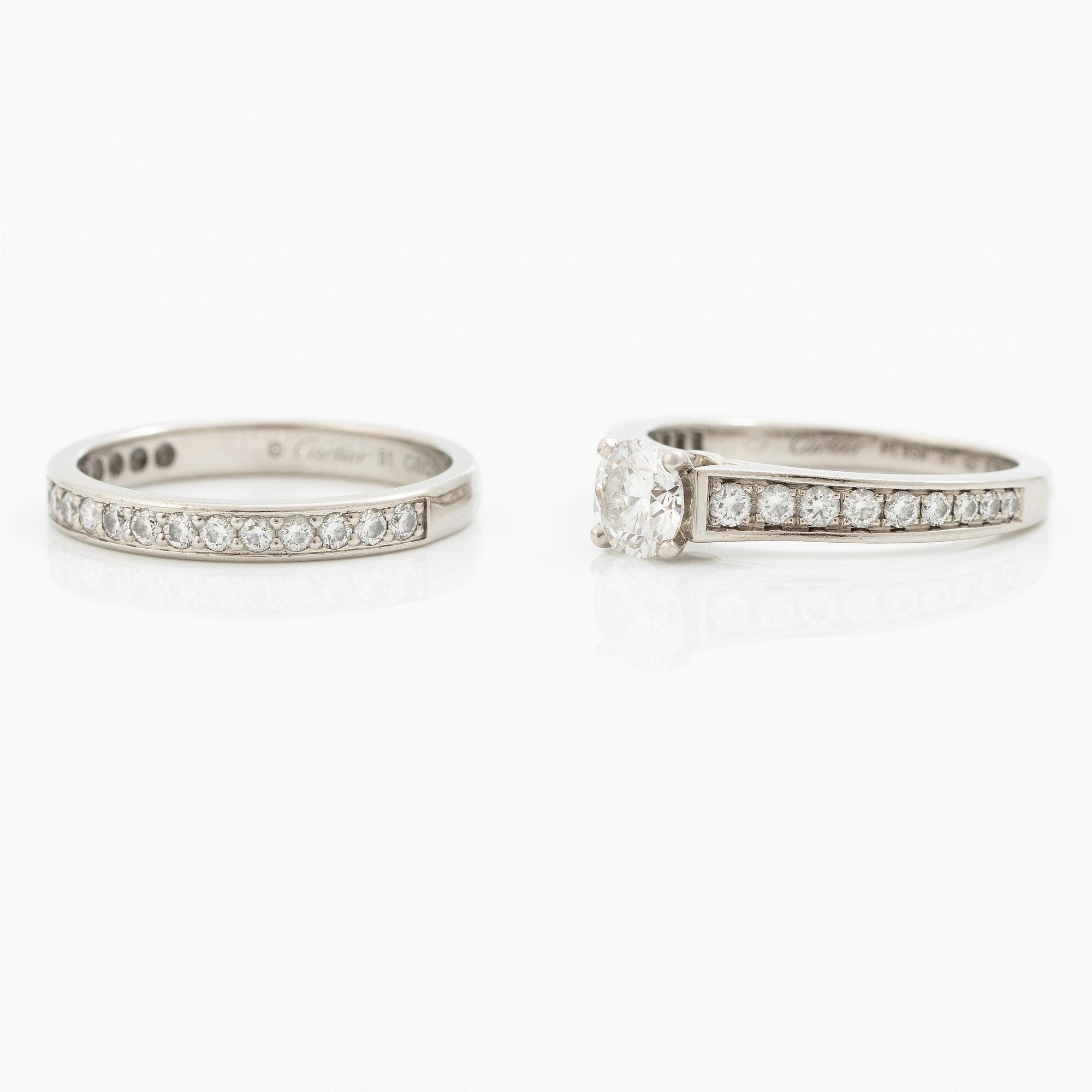Cartier two rings platinum with round brilliant-cut diamonds.