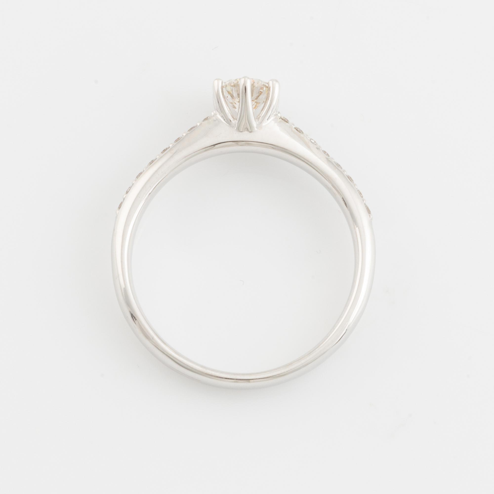 Brilliant cut diamond solitaire ring, with IGI report.