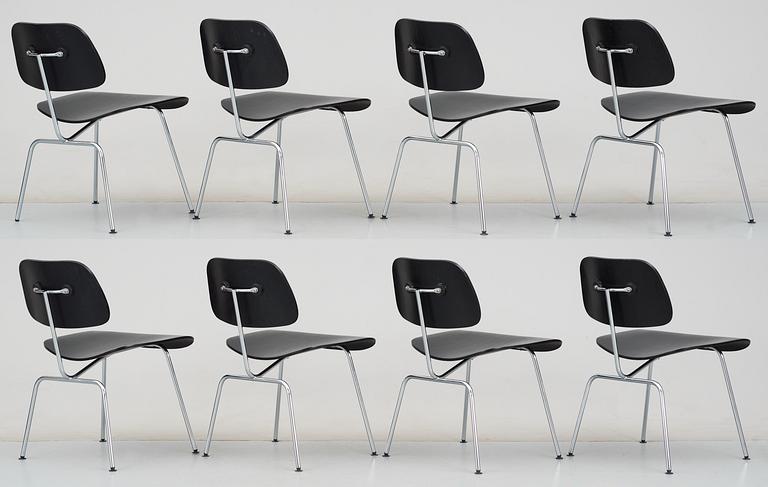 A set of eight Charles & Ray Eames 'DCM' chairs by Vitra.