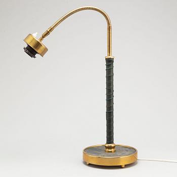 JOSEF FRANK, a brass table lamp, model '2434', for Firma Svenskt Tenn, second half of the 20th century.