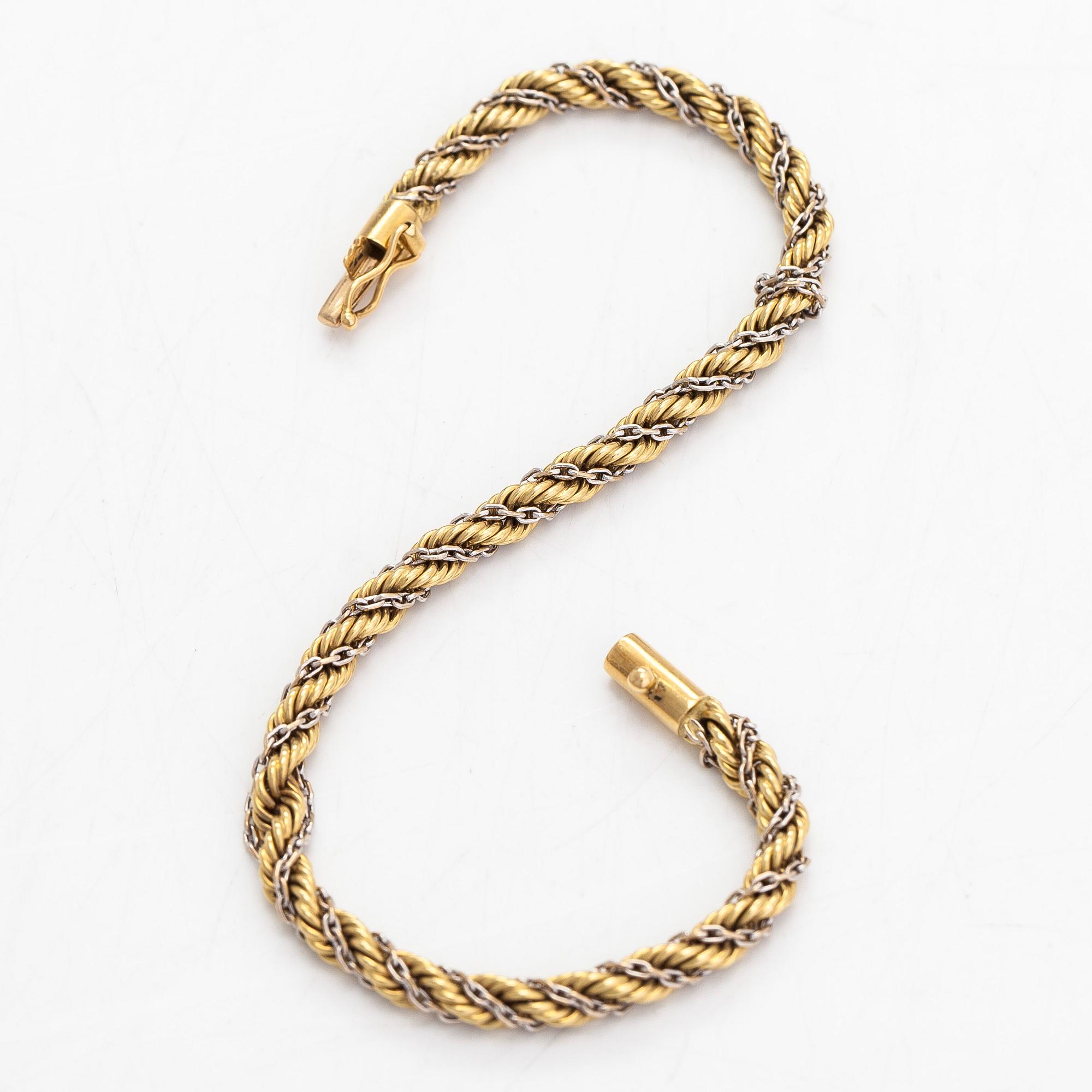 Armband, tvinnad cordellänk, 18K guld/vitguld. Utländsk stämpel.