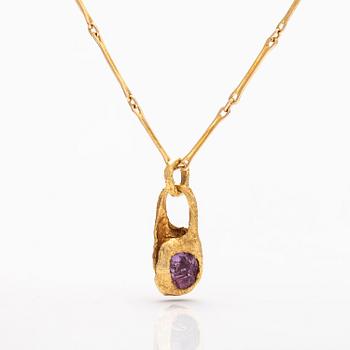 BJÖRN WECKSTRÖM, A 14K gold pendant "Reindeer clock" with an amethyst and chain "Raito". Lapponia 1978  and 1982.