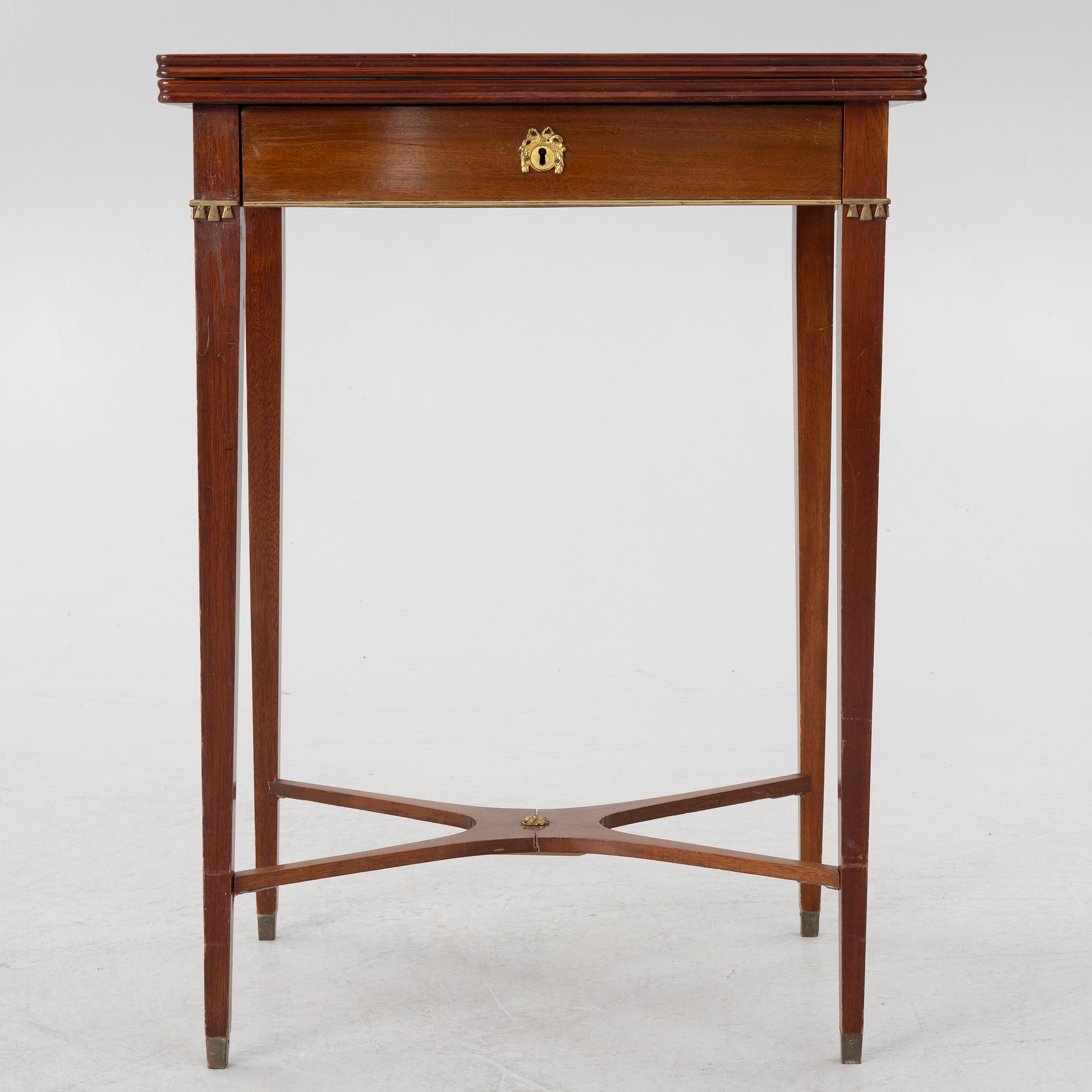 A late Gustavian style games table/sewing table, early 20th century.