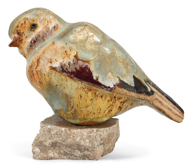 A Tyra Lundgren stoneware figure of a bird.