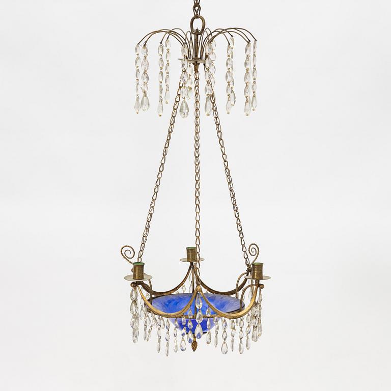 A late Gustavian three-light chandelier, Stockholm, late 18th century.