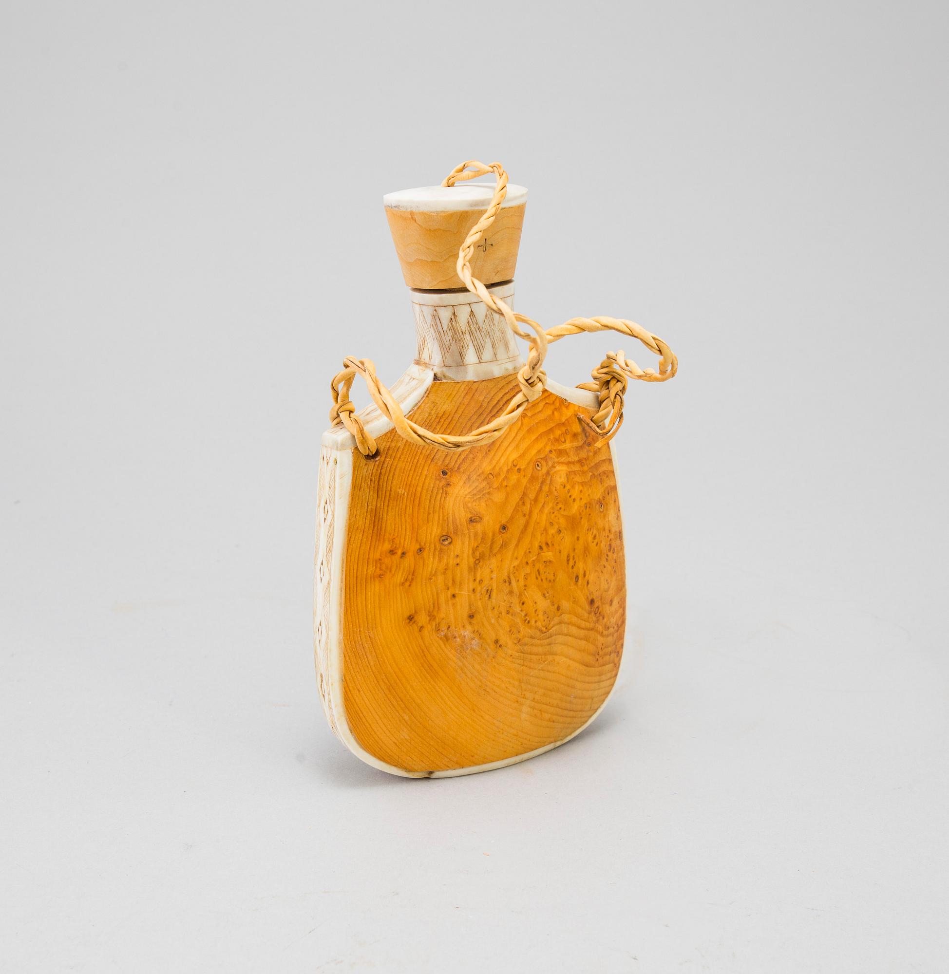 A Sami knife and bottle, Knut Dahlgren, Arvidsjaur, signed KD, second half of the 20th Century.