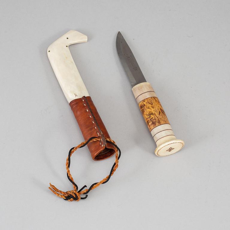 A Sami reindeer horn knife, unidentified signature.