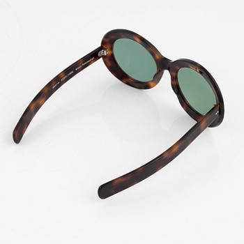 Oliver Goldsmith, a pair of tortoise "Koko" sunglasses.