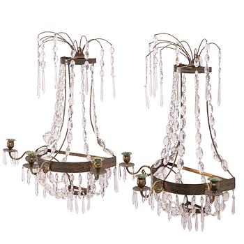 Wall lights, a pair, for three candles, 19th century, Empire style.
