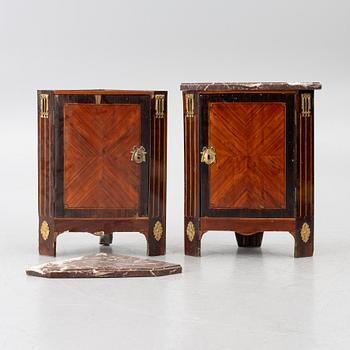 A pair of corner cabinets, Directoire, France, circa 1800.