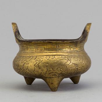 A Chinese early 20th century gilt-bronze censer, with Xuandes six character mark to the base.