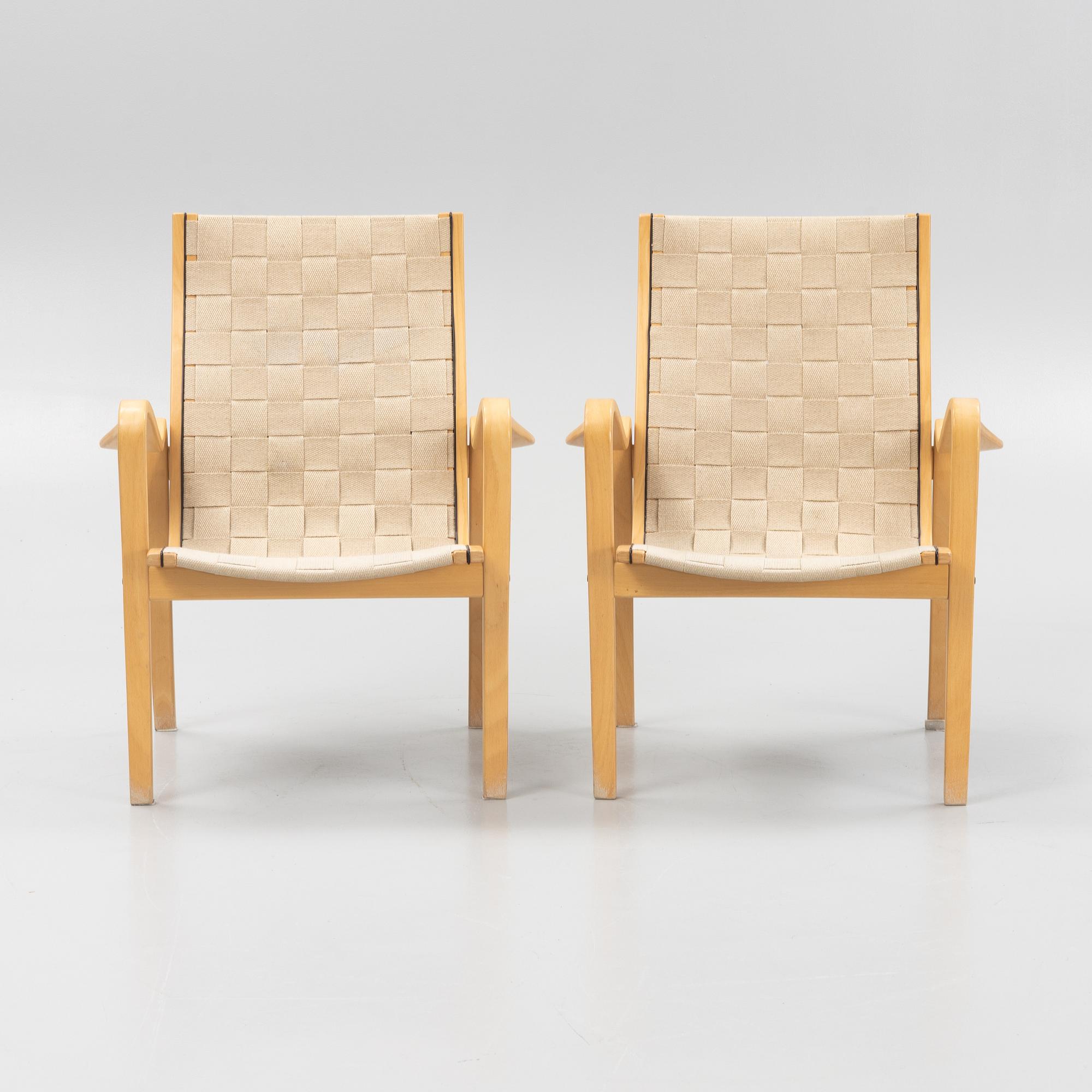 A pair of lounge chairs from Källemo.
