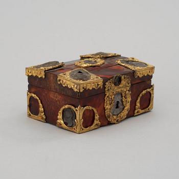 A Baroque 18th century tortoiseshell veneered casket.