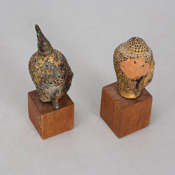 A group of two heads in wood and bronze, Thailand, Bangkok, circa 1900.