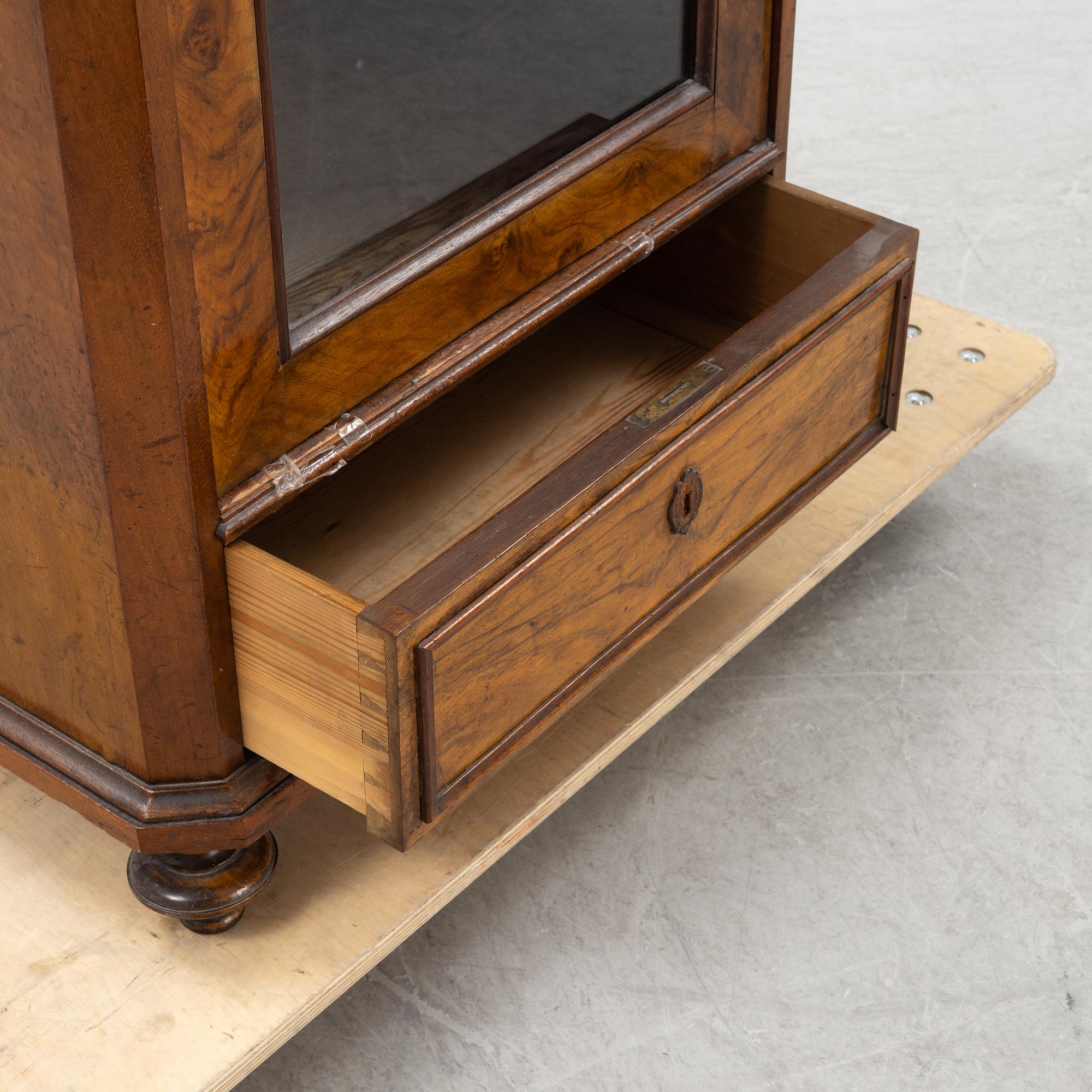 A walnut veneered cabinet, second half of the 19th Century.