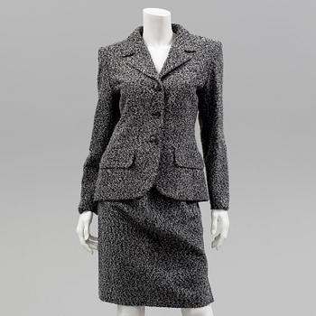 A womens two piece suit by Yves Saint Laurent.