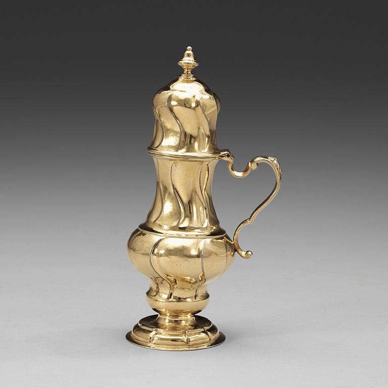 A Baltic mid 18th century silver-gilt mustard-pot, marks of Johann Christian Henck, Riga 1756-1760.