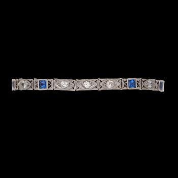 A brilliant cut diamond, tot. app. 0.60 cts, and blue sapphire diamond bracelet.