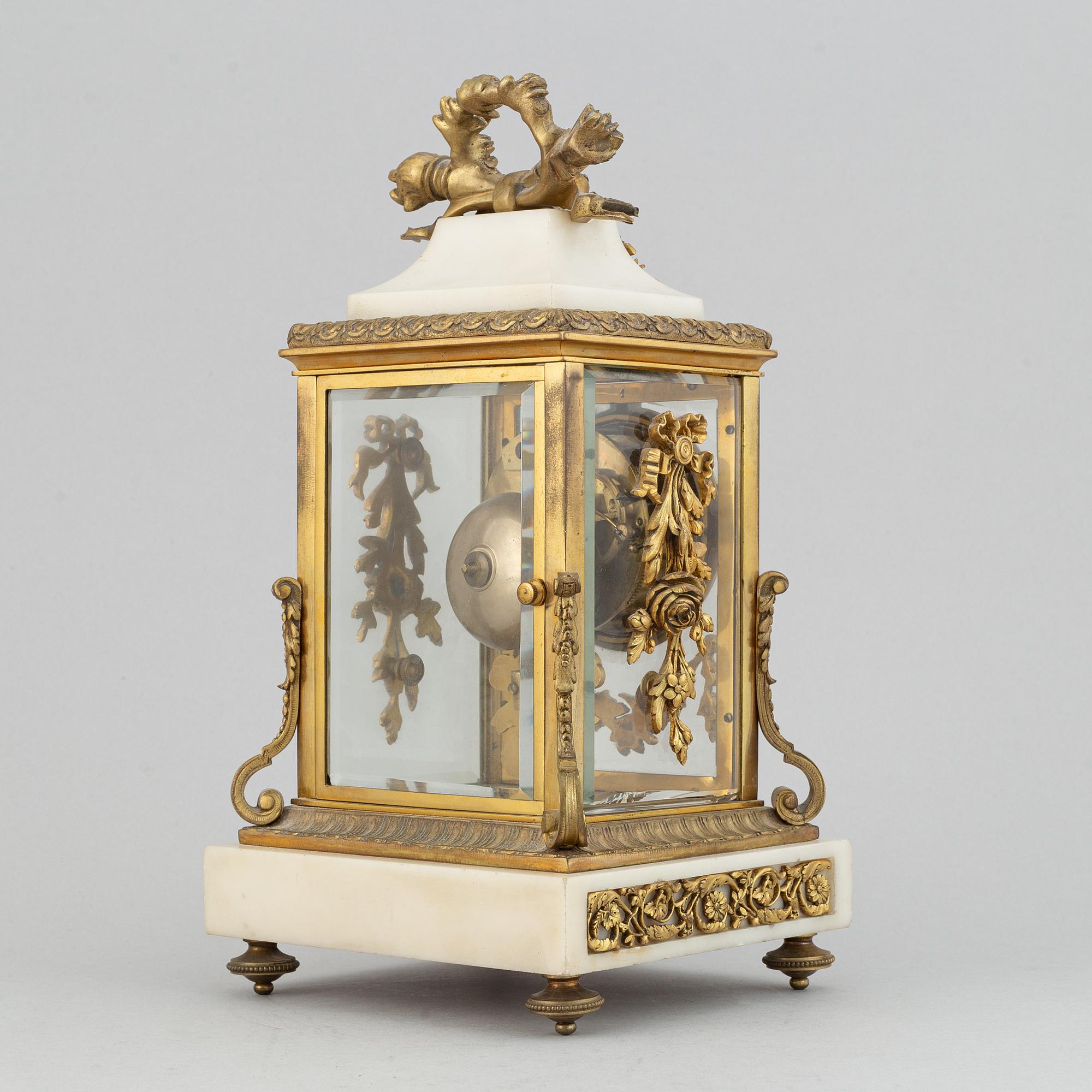 A circa 1900 Louis XVI-style mantle clock.