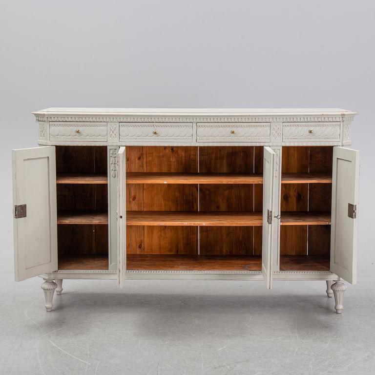 A painted Gustavian style cupboard, 19th Century.