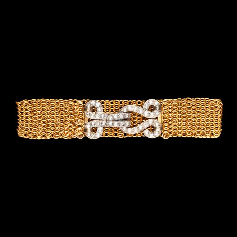 A gold and diamond clasp bracelet, turn of century 1900.