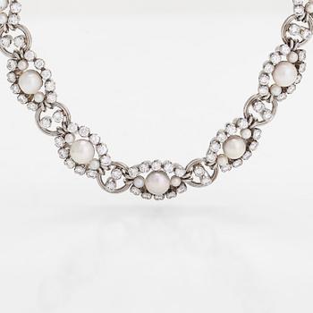 A.Tillander, a platinum necklace/bracelet, with brilliant-cut diamonds totalling approx. 6.72 ct and cultured pearls.
